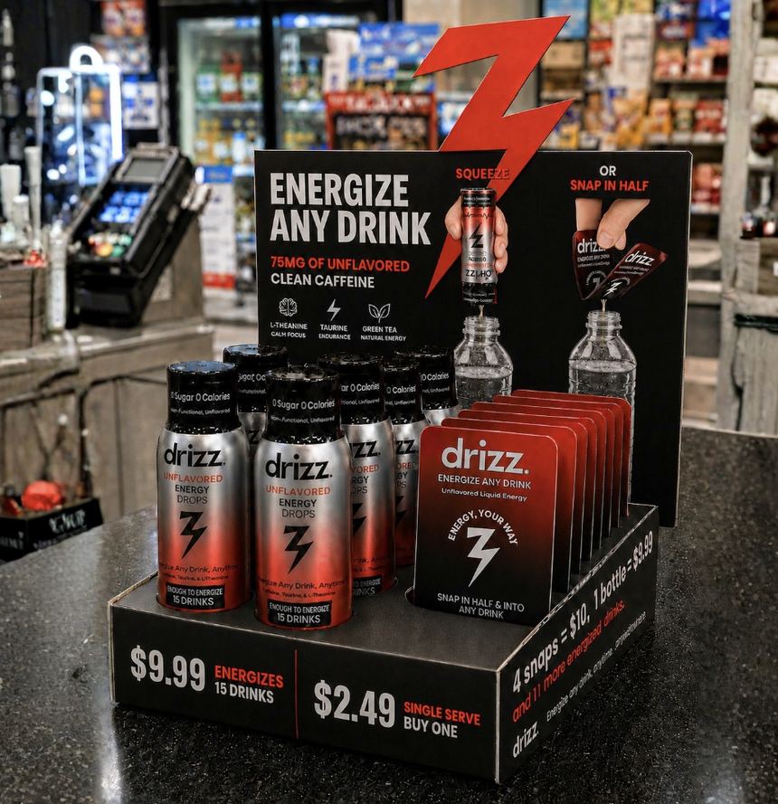 Drizz counter display holding bottles and single serve snaps